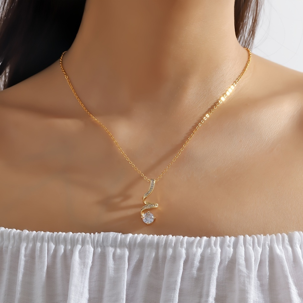 Exquisite 18K Gold-Plated Zircon Pendant: Elegant Rotating Design - Picture 5 of 7